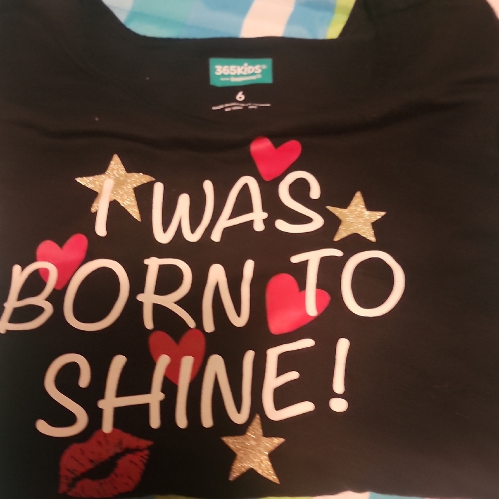 Black Shirt with Red and Gold Accents